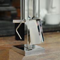 Close up of Polished Steel Companion Set Base & Tools 