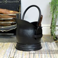 Black Traditional Coal Bucket With Shovel in Situ