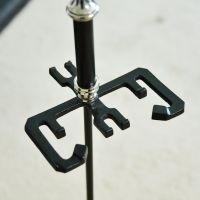 Close up of Nickel & Black Companion Stand 