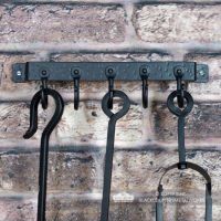 4 Hook "Blacksmith Style" Wall Mounted Fireside Tool Rack in Situ on the Wall holding tools