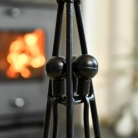 Close up of Triangular Companion Set with Tool Stand 