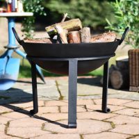 Traditional garden fire pit on patio