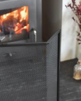 Close up of mesh detailing on curved fire screen
