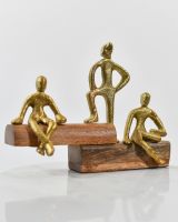 Angled view of gold cast aluminium home decor art sculpture