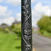 Floral Detailing On Antique Silver Lamp Post Column