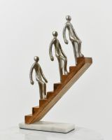 Angled view of cast aluminium, mango wood and marble sculpture