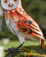Front view of colourful steel garden sculpture