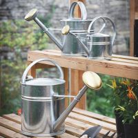 Galvanised Traditional Watering Can Next to the Other Size Available 