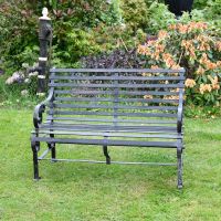 Black Two Seater Park Bench in Situ on Lawn