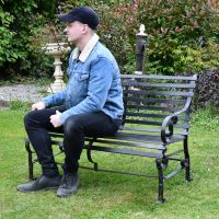 Black Two Seater Park Bench in Use