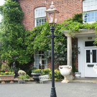 Copper victorian lamp post outside town house