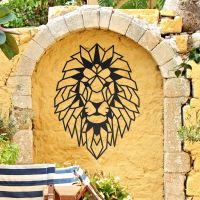 Geometric Lion Steel Wall Art in a Display in the Garden on a Yellow Wall