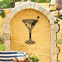 Geometric Steel Martini Glass Wall Art on a Yellow Garden Wall