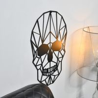 Side profile of geometric skull on wall 