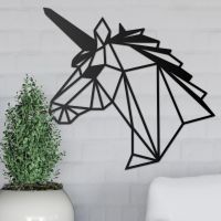 Geometric Unicorn Wall Art on the Wall Next to Plants
