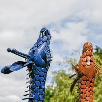 Close up of metal framework on giraffe heads 