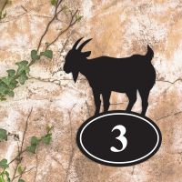 Goat Iron House Number Sign in Situ on a Rustic Wall 