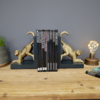 Gold Painted Monkey Bookends in Situ in the Home