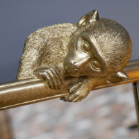 Close-up of the Gold Painted Monkey on the Mirror