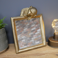 Gold Painted Monkey Mirror in Situ on a Cabinet