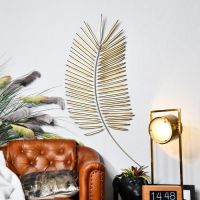 Golden Palm Leaf Wall Art in Situ on a White Wall
