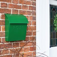 Green Contemporary Postbox in Situ on a Brick Wall