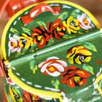 Close-up of the Hand Painted Floral Design on the Top of the Watering Can