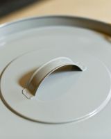 Close Up Of Grey Ash Bucket Lid 