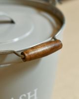 Close Up Of Grey Ash Bucket Wooden Handle
