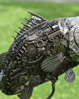 Close up of detailing on Recycled Metal Grouper Sculpture side
