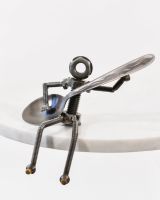 The guitarist recycled metal sculpture