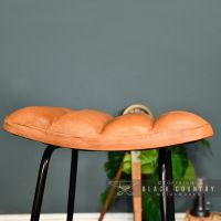 Close-up of the Top of the Seat Created from Brown Buffalo Leather