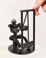 Scale image of recycled metal gym sculpture