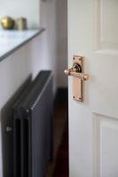 Hammered Polished Copper Lever Latch Door Handle on Door