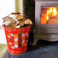 red Narrow Boat Style Bucket Log Holder in Situ