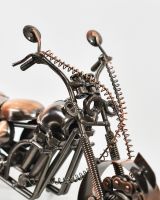 close up of handlebars on scrap metal art sculpture