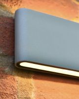 Close up of downlighter on up & down garden wall light