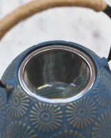 Close up of "Himawari" Blue and Gold Cast Iron Japanese Style Teapot strainer