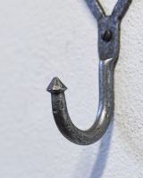 Close up of hook detail on wall mounted hook