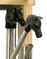 Close up of Wall Mounted equestrian Boot rack with horse heads