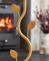 Close up of intricate leaf detail on fireside companion set
