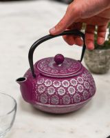 Scale Shot of Japanese Inspired "Boysenberry" Purple & Silver Cast Iron Teapot