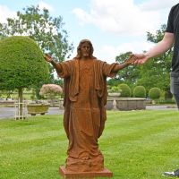 "Christ the Redeemer" Cast Iron Statue with Male for Scale