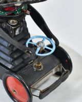Close up of Go Karting Robot Recycled Material Sculpture steering wheel