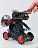 Scale image of Go Karting Robot Recycled Material Sculpture