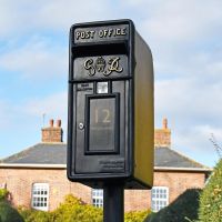 King George Rex Black Period Post Box in Situ Outdoors