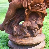 Close up of Cast Iron Greek Lady Statue with Grapes and Plinth