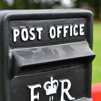 "Post Office" Embossed Text on the Front of the Post Box