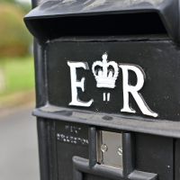 Wording E R on the Front of the Post Box Finished in White