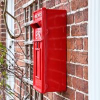 Side view of Red Elizabeth Regina Post Box 